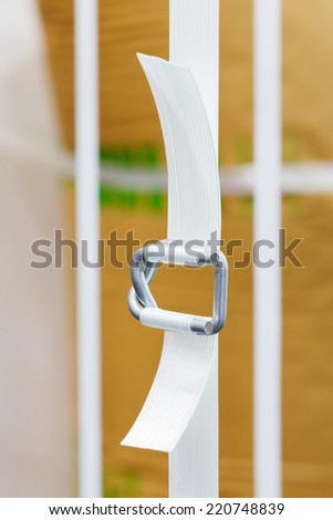 Close up heavy duty white color nylon strapping with metal buckle
