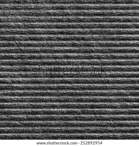 Close up black color corrugated paper texture