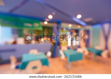 Abstract blurred food court or canteen with defocused light boken
