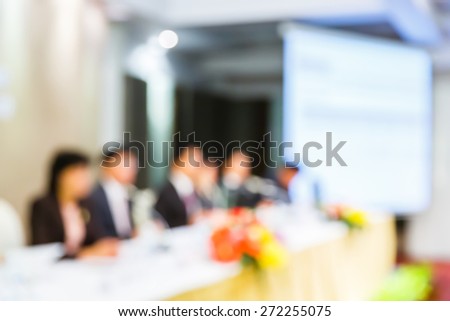 Abstract blurred people lecture in seminar room, education or business concept