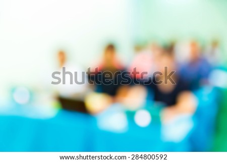Abstract blurred people lecture in seminar room, education concept