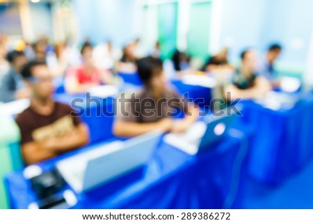 Abstract blurred people lecture in seminar room, education concept