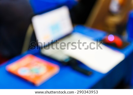 Abstract blurred notebook or labtop in seminar room, education concept
