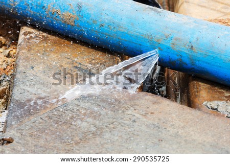 Water leaking on pvc discharge hose in construction site