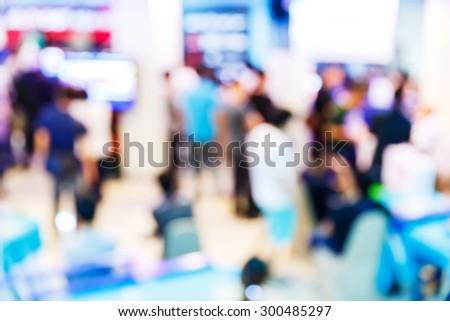 Abstract blurred people in game center, entertainment concept