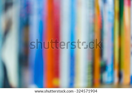 Abstract blurred books on shelf, education concept
