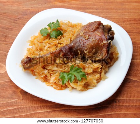 Baked goose with cabbage