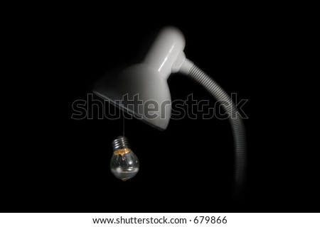 Desk Lamp with hanging bulb half filled with water .. looking like a teardrop