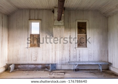 An old abandoned one room school house on the prairies