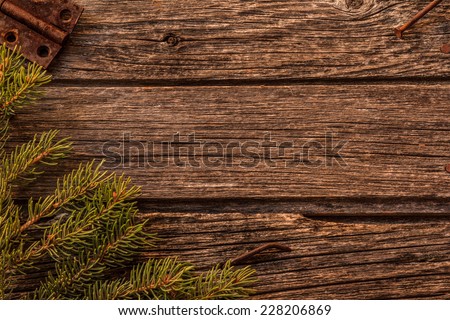 Rustic Christmas Background - Aged Barn Wood with Pine Tree Branch