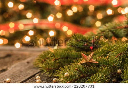 Rustic Christmas Background - Aged Barn Wood with Pine Tree Branch