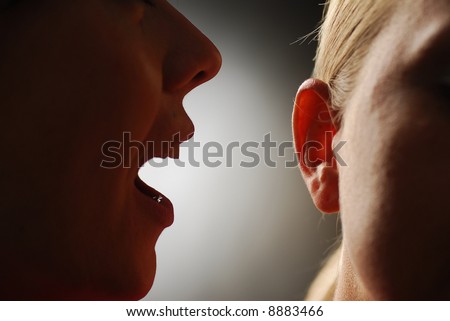 Someone whispering to ones ear