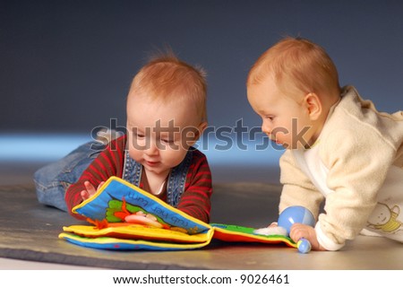 stock photo : Babies playing with toy