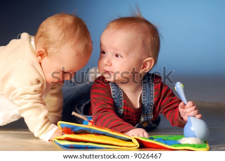 stock photo : Babies playing with toys