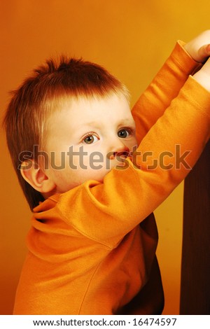 Boy in orange clothes