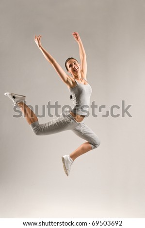 An Attractive pretty sexy jumping woman