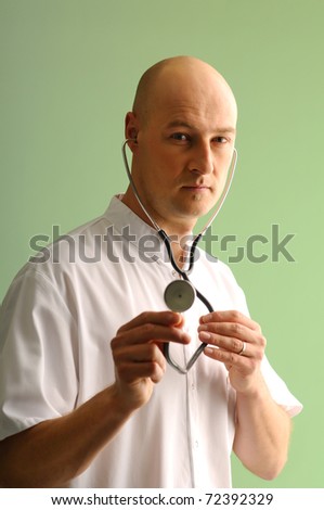 Portrait of medical assistant using stethoscope