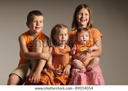 portrait of four siblings