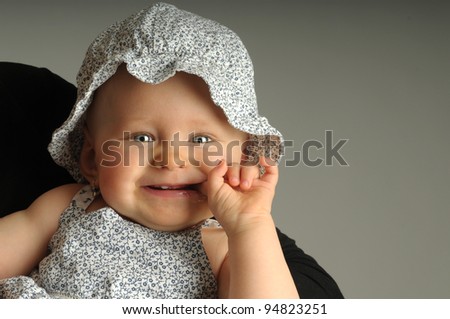 Picture of one little girl in cap