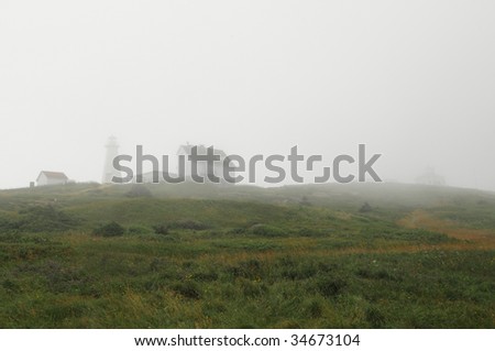 Lighthouse at Cape Spear, Newfoundland in the fog - North America\'s easternmost point