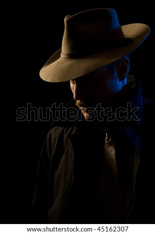 Scary-looking bad guy in hat, looking at you with menace
