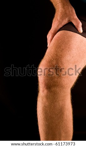 Close up, man\'s bent knee