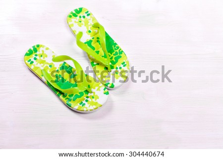 picture of green flip-flops