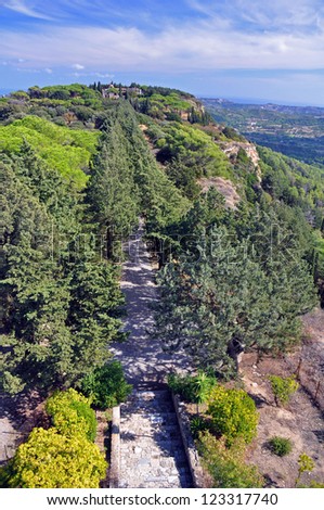 the road to ialyssos monastery in rhodes greece seen from the top of the cross