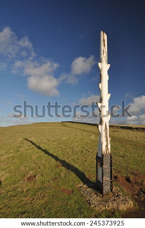 The old coastguard wreck post on the headland at Baggy Point. The post is passed by walkers who follow the path from Croyde to Baggy Point on the Southwest Coast Path, North Devon, England.