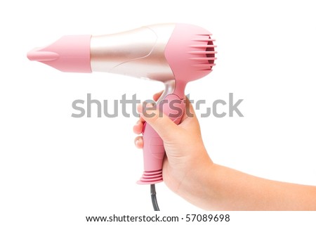 pink hair dryer. stock photo : Compact pink hairdryer in hand