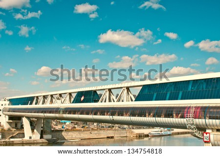 MOSCOW, RUSSIA - APR 08: Commerce and pedestrian bridge \