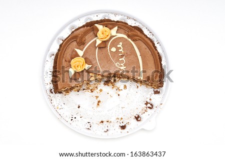 Half-eaten cake on white background