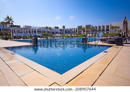 AGADIR, MOROCCO - JUL 08, 2014: Swimming pool  Hotel Sofitel Agadir Royalbay Resort is located in the magnificent beach of Atlantic ocean with golden sand and imbued  the spirit of modern luxuryl