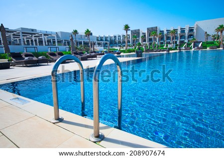 AGADIR, MOROCCO - JUL 08, 2014: Swimming pool  Hotel Sofitel Agadir Royalbay Resort is located in the magnificent beach of Atlantic ocean with golden sand and imbued  the spirit of modern luxury