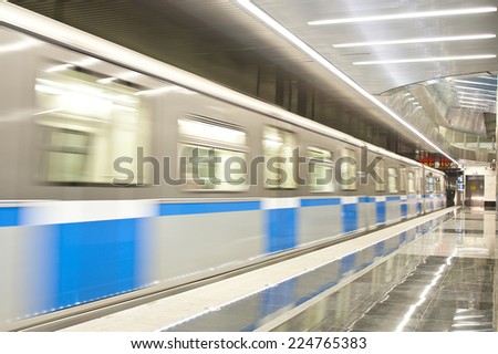 MOSCOW, RUSSIA - SEPTEMBER 26, 2014: Moving train in Metro station Delovoy Center in Moscow, Russia. Station Delovoy Center was opened 31 January 2014