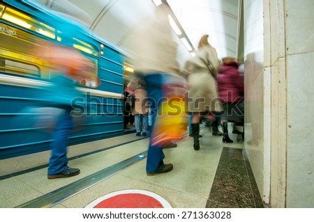 MOSCOW, RUSSIA - APRIL 17, 2015: Train and passengers  in subway station Mendeleevskaya in Moscow, Russia
