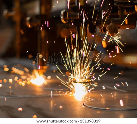 Fireworks of CNC LPG gas cutting close-up