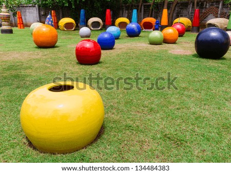 Colorful garden with ball chair