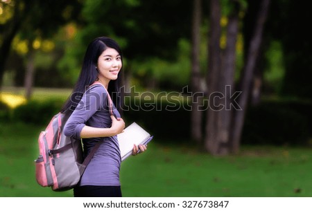 Asian woman college student on campus