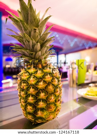 Fresh pineapple on drink bar in pub