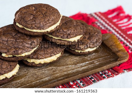 Home made stuffed chocolate cookies with peanut cream
