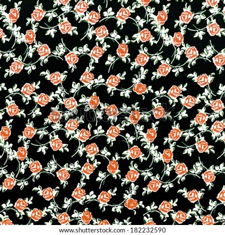 Rose Fabric background, Fragment of colorful retro tapestry textile pattern with floral ornament useful as background, on black background.