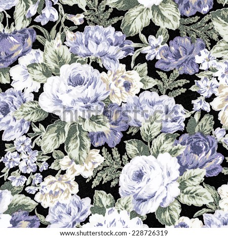 Blue Rose Vintage On Fabric Background, Fragment of colorful retro tapestry textile pattern with floral ornament useful as background.