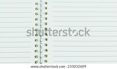 Blank note book with ring binder holes isolated on white