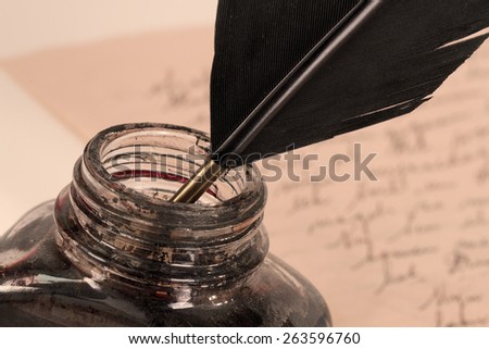 Quill and Inkwell in Sepia look Photograph