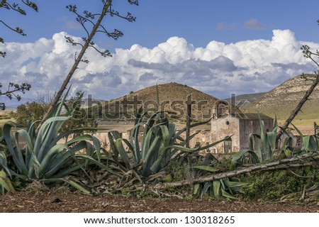 It is an abandoned farmhouse with a chapel that was widely used to make films set in the natural park in Almeria, Spain