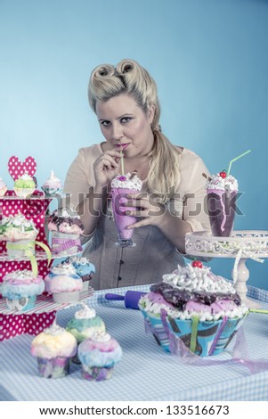is a girl from the sixties with cupcakes