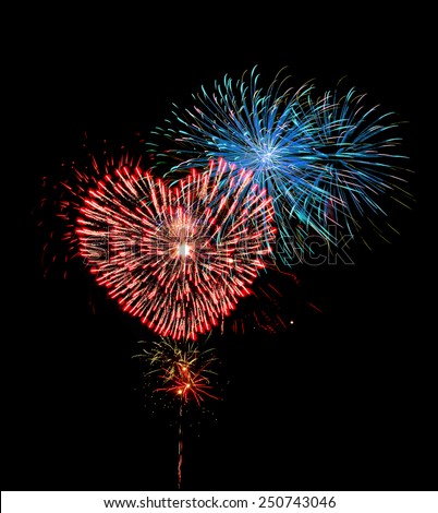 Big red heart shaped firework. Celebration fireworks display