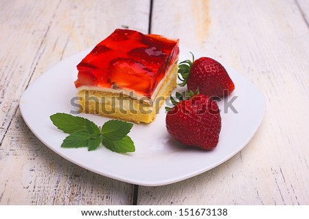 cake with strawberries and strawberry jelly with cream pudding