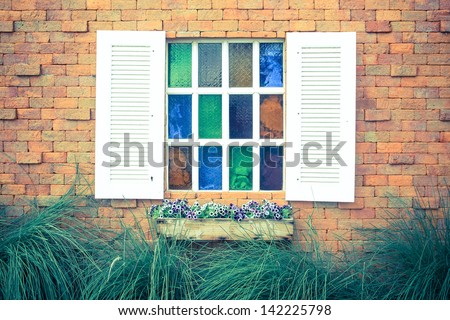 Vintage white window on brick wallpaper